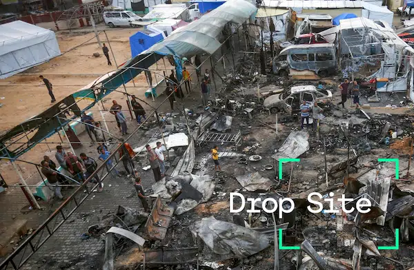 MR Online | Palestinians inspect the targeted area on the tents housing displaced civilians after Israeli attacks in the courtyard of Al Aqsa Martyrs Hospital in Deir Al Balah Gaza on October 14 2024 Photo by Ashraf AmraAnadolu via Getty Images | MR Online